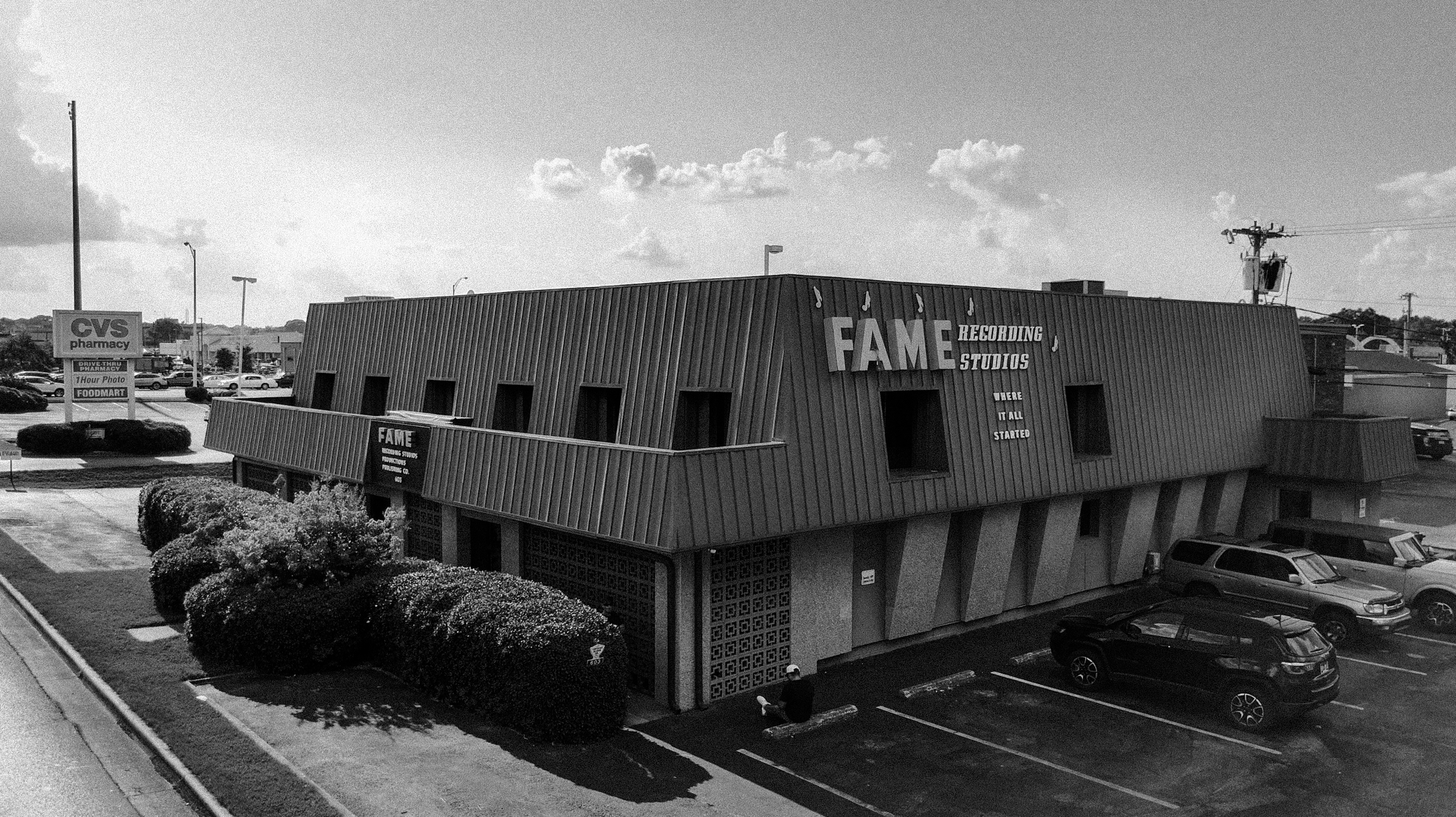 Black and white aerial view of the FAME Recording Studios building and parking lot